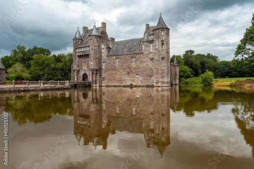 The beautiful lake of the Chateau Trecesson, medieval castle, Campénéac commune in the Morbihan department, near the Broceliande forest.