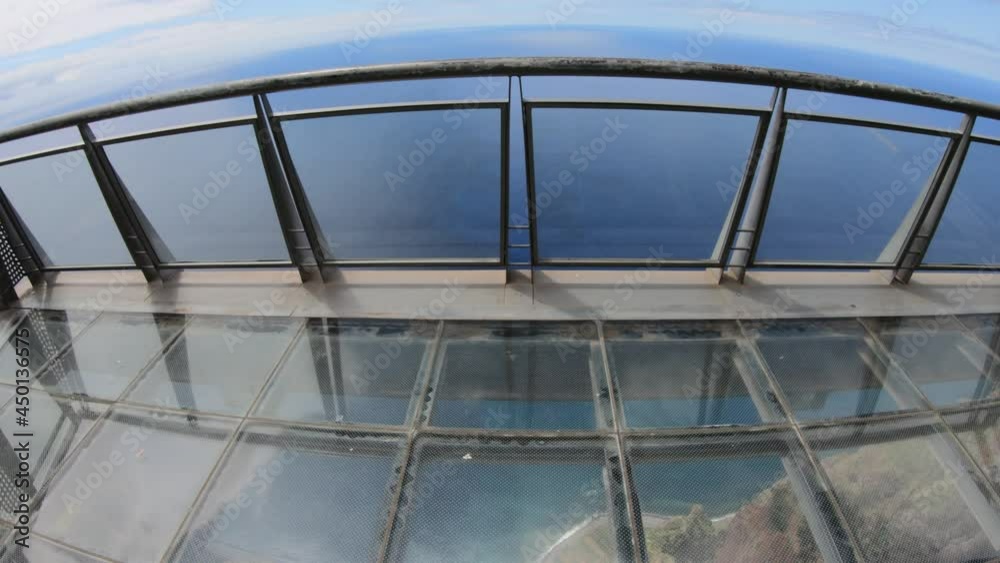 POV shot of a man at Cabo Girao cliff, Madeira, Portugal