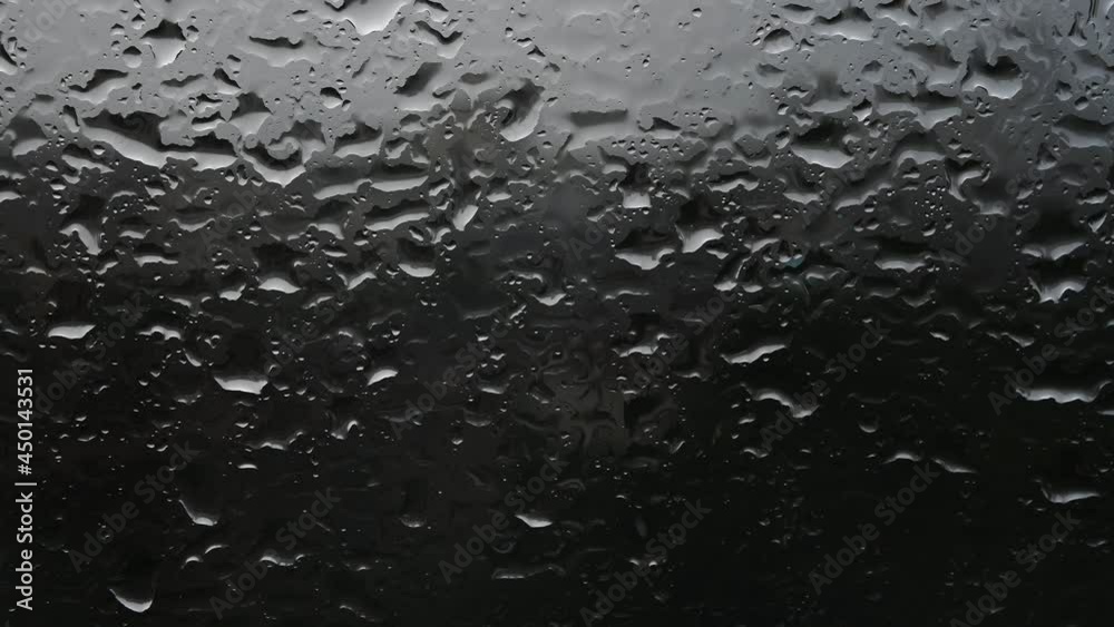 Closeup of rain drops on teh window. Rainy weather concept. Closeup of rain drops on teh window. Rainy weather concept.