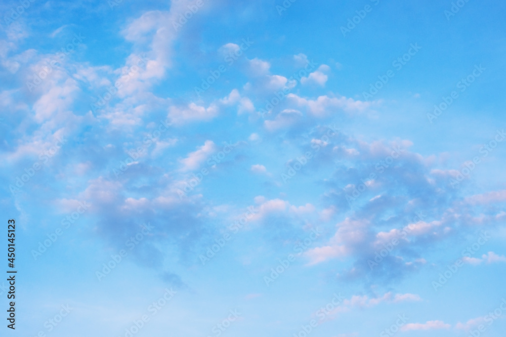 Beautiful white clouds in blue sky. Cirrocumulus clouds formation