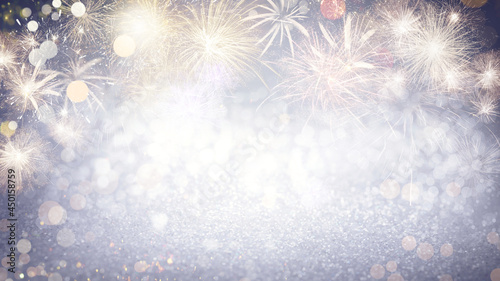 Abstract festive background with fireworks  bokeh effect. New Year celebration