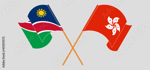 Crossed and waving flags of Namibia and Hong Kong