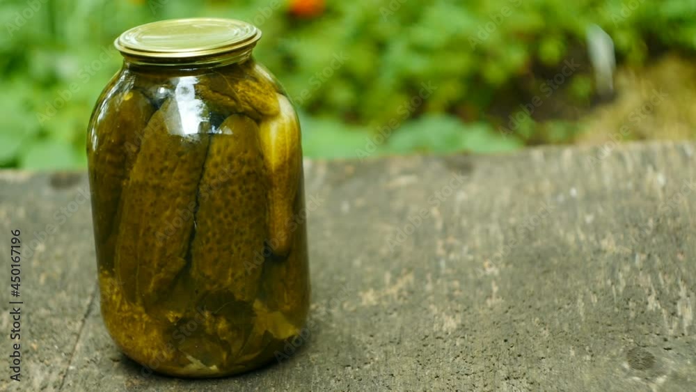 homemade canned cucumbers in a glass jar close-up camera in motion homemade canned cucumbers in a glass jar close-up camera in motion