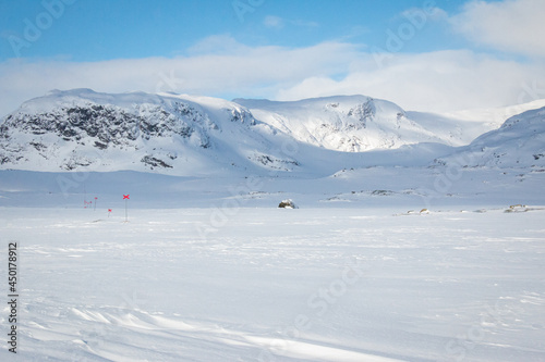 Snowshoeing Kungsleden trail close to Alesjaure hut early in the morning in April 2021, Lapland, Sweden © Alena V
