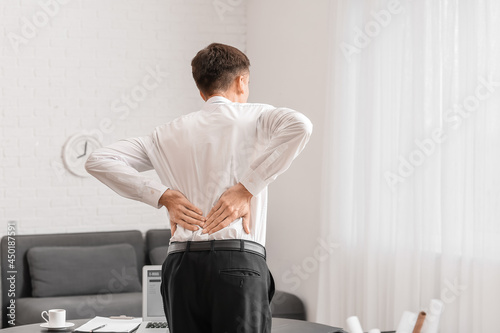Young man suffering from ba...