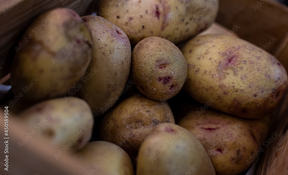 organic potatoes in wooden box
organic potatoes in wooden box