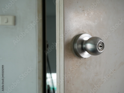 stainless door knob or handle and key hole.