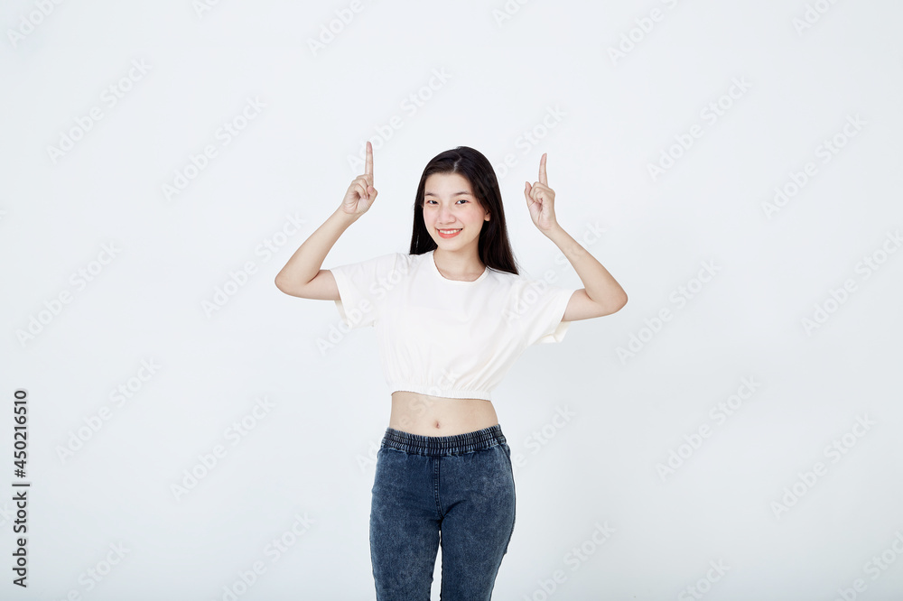woman pointing finger away at copy space woman pointing finger away at copy space