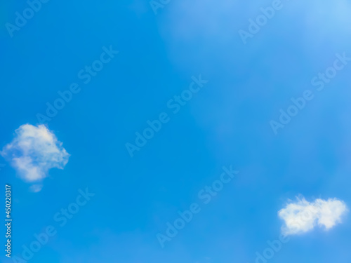 Copy and text space with background of bright blue skies and white clouds.Copy and text space concept.