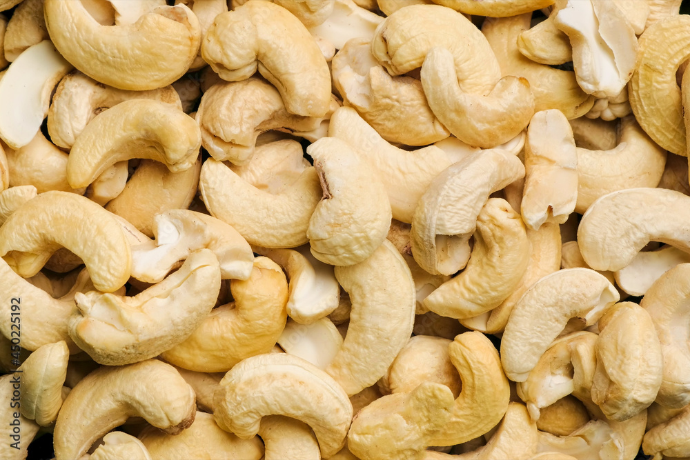 Top view raw cashew nuts rotation, close up. Top view raw cashew nuts rotation, close up.