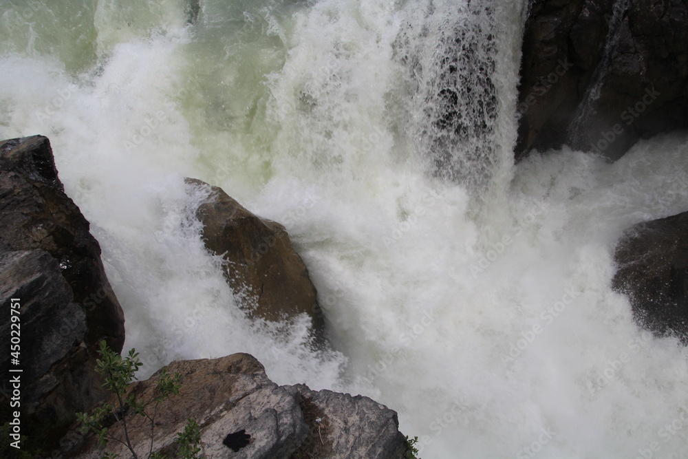 Rock In The Waterfall, Jasper National Park, Alberta Rock In The Waterfall, Jasper National Park, Alberta
