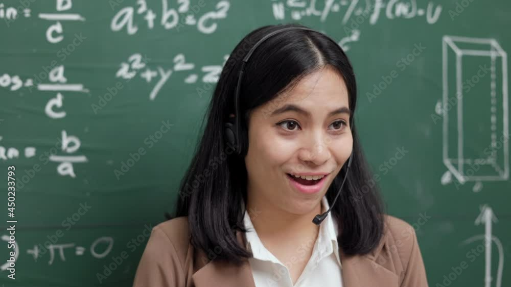 Young asian teacher woman teaching speak to camera video conference with student. Female teacher training the mathematics in classroom blackboard online course. Young asian teacher woman teaching speak to camera video conference with student. Female teacher training the mathematics in classroom blackboard online course.