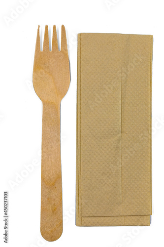 Recycle eco friendly disposable  fork and napkin paper in top view isolated on white background. photo