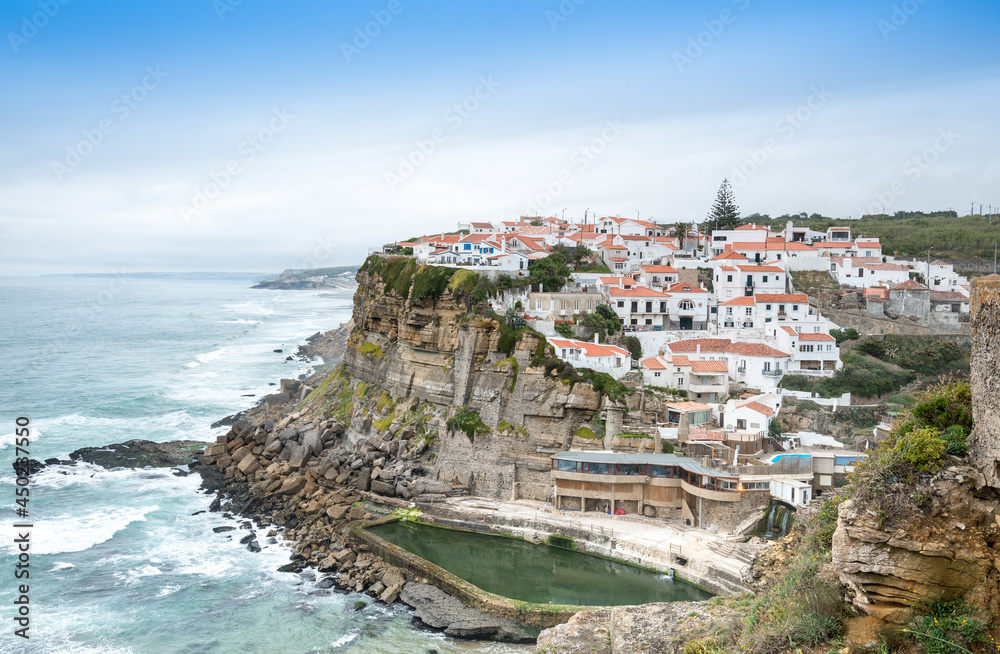 Azenhas do Mar white village landmark on the cliff and Atlantic ocean, Sintra, Lisbon, Portugal, Europe.