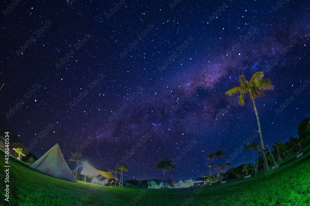 The starry night camping with the Milky Way on the grass field at summer in Tokyo The starry night camping with the Milky Way on the grass field at summer in Tokyo