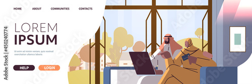 arab couple with credit card using laptop online shopping concept man woman ordering goods together