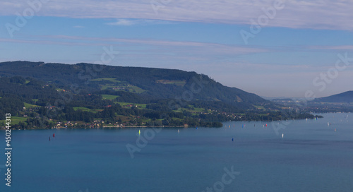 Lake attersee at morning cloudy sky with small sailboat ship from hill schoberstein. Austria, Salzburg
