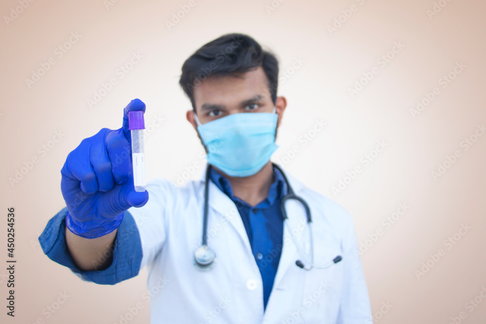 Laboratory assistant analyzing a blood sample Laboratory assistant analyzing a blood sample
