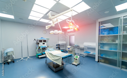 Fototapeta Naklejka Na Ścianę i Meble -  Empty modern operating room in surgical clinic. Clean sterile operating ward.