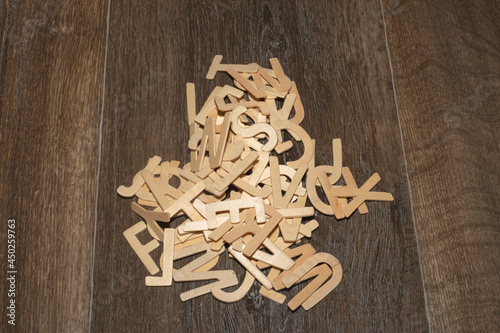 Wooden letters on a brown background