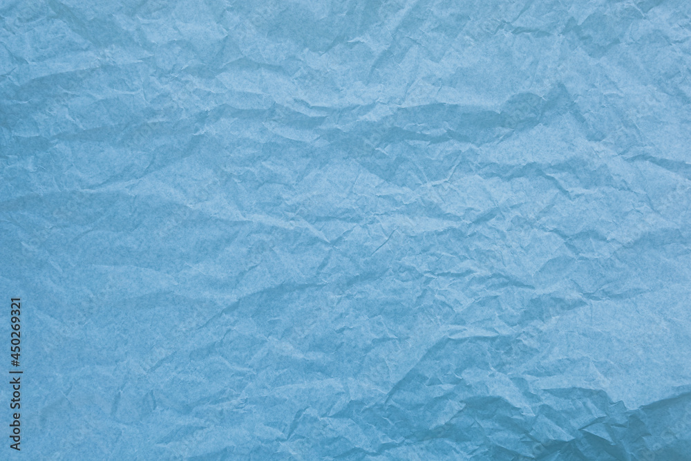 Obraz premium Blue paper with wrinkles texture