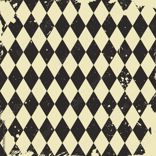 Seamless grunge pattern with black rhombus. Scratched Chess or diamonds symmetric background.