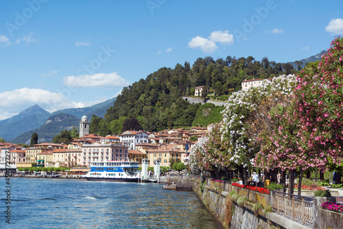 Scenic View of Bellagio Town in Summer and Como Lake in North of Italy.Blooming Oleander Trees in a Row