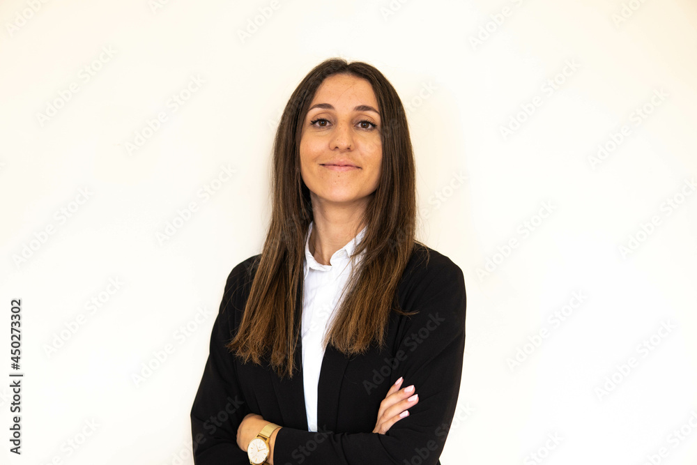 Photo of a young and attractive woman looking corporative with a shirt smiling at the camera, looking professional and ready to do bussiness with a white background