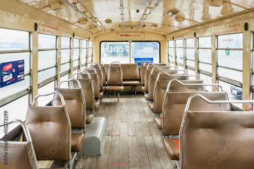 Bangkok, Thailand -August, 04, 2021 : Empty leather seat inside the vintage auto bus of bangkok metropolis, thailand transportation