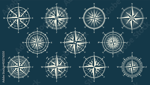 Vintage marine wind rose, nautical chart. Monochrome navigational compass with cardinal directions of North, East, South, West. Geographical position, cartography and navigation. Vector illustration.