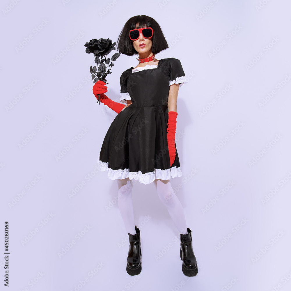 Demonic gothic brunette Lady posing in white studio. Role-playing games, halloween, party shop accessories concept