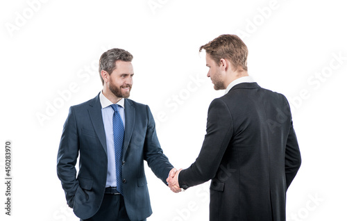 two businessmen colleagues shaking hands after successful business deal, cooperation © Olena