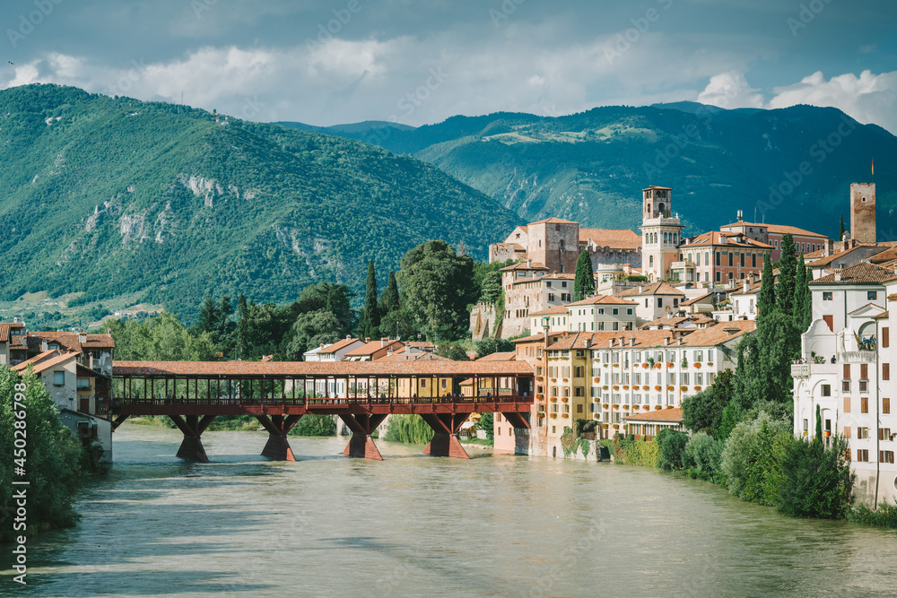 Bassano del Grappa, Italy. View of the Alpini bridge and the historic center from the Brenta river 