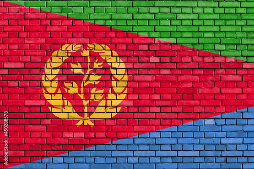 flag of Eritrea painted on brick wall