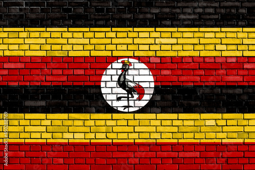 flag of Uganda painted on brick wall