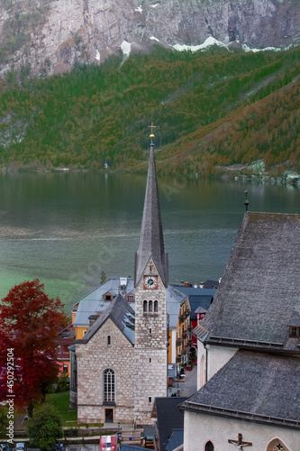 Vertical view of Lake Church at Hallstatt, Austria. Hallstatt village on the bank of Hallstatter lake in High Alps mountains-Autumn mood background © SASITHORN
