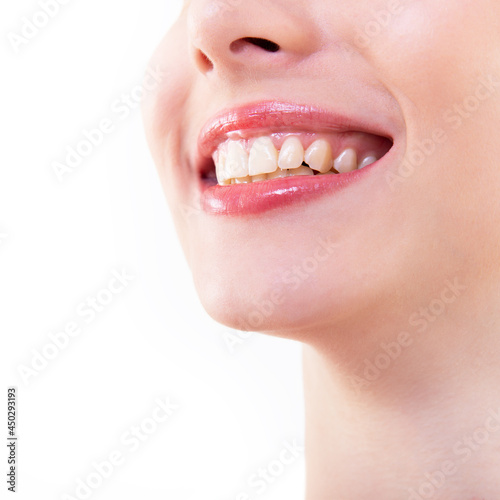 Smile. healthy and beautiful. Laughing woman  female mouth with great teeth over white background. Teeth health  whitening  prosthetics and care. Happiness and joy