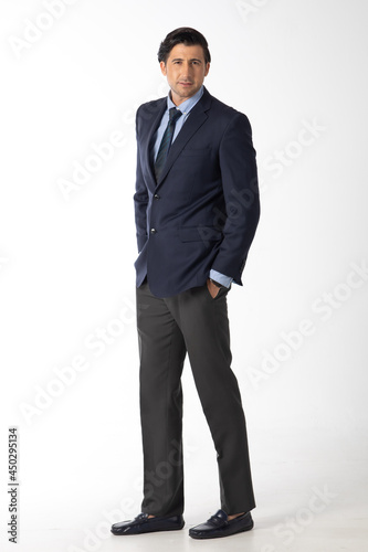 Portrait confident happy smilling handsome business man in suit on white background. Caucasian people.