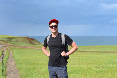 Russian tourist on the path of the Cape Kharantsy in Olkhon island, Russia