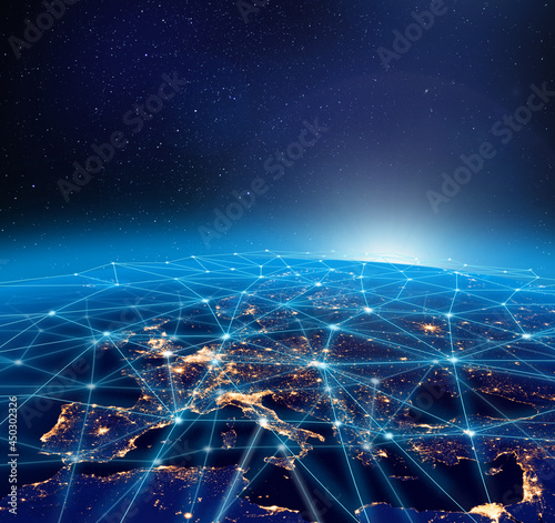 Fototapeta Naklejka Na Ścianę i Meble -  Planet Earth, city lights and worldwide digital network infrastructure concept