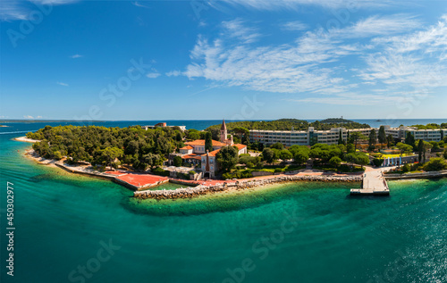 Red island near by Rovinj city in Croatia. Croatian name is Otocic Maskin. It has a hotel, aquapark, chruch monument and amazing beaches photo