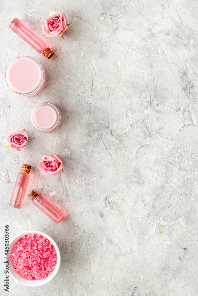 Essential rose oil with cosmetic products for skin care