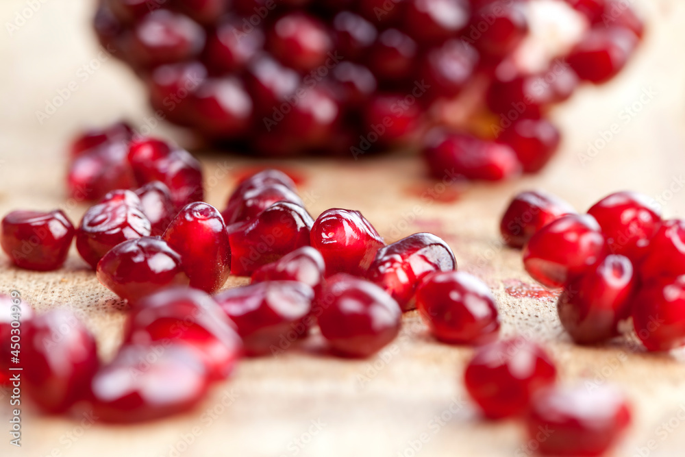 red and ripe fruit pomegranate with red grains red and ripe fruit pomegranate with red grains