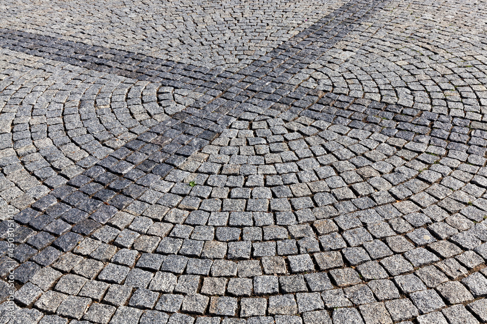Fototapeta premium a modern road made of cobblestones and stones