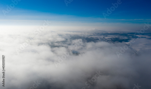 Amazing aerial shot of clouds in the sky © yauhenka