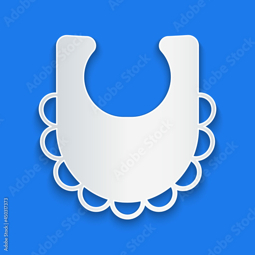Paper cut Baby bib icon isolated on blue background. Paper art style. Vector