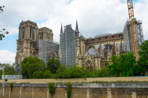 Notre-Dame de Paris cathedral under reconstruction and renovation after the fire of April 2019. Construction Site Of Fire Damaged Building Of Notre-Dame Cathedral Being Rebuilt.