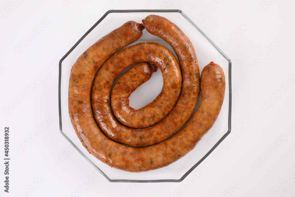Fototapeta premium Local Northern Thai food , Northern Thai spicy sausage street food isolated in white background