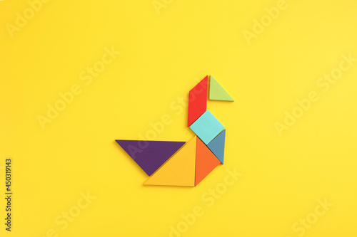 Free Download Wooden blocks duck isolated in yellow background - GFXLoad