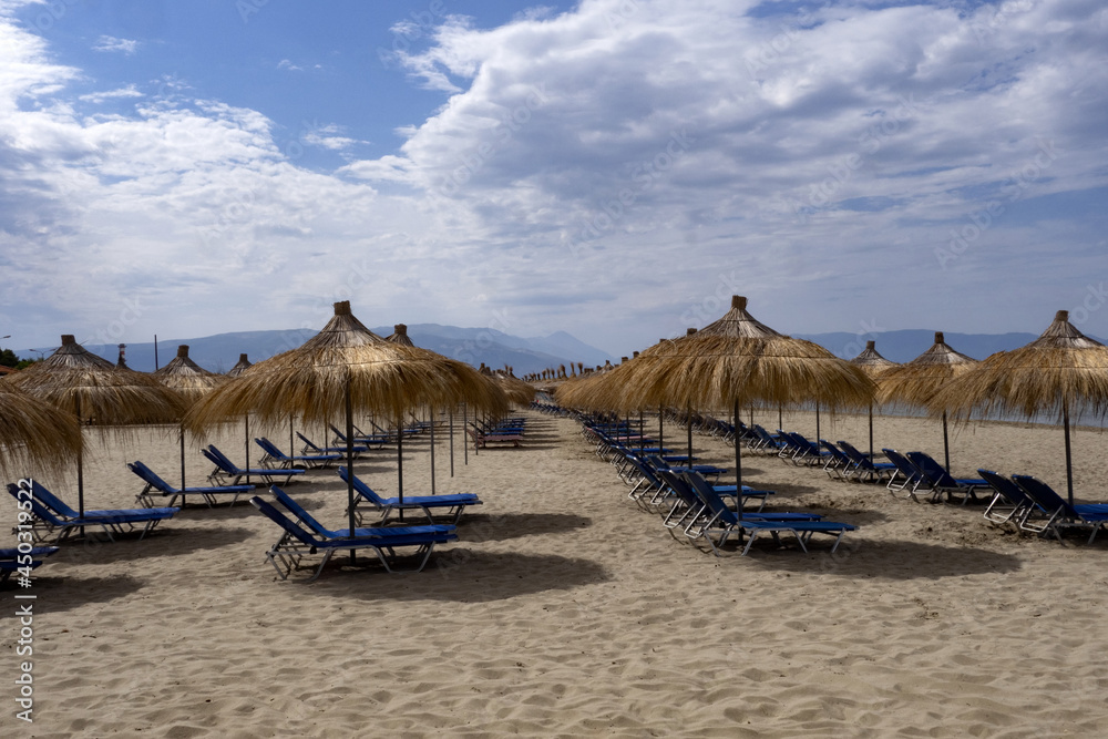 Tourist beaches on the Adriatic coast of Albania are clean and full of parasols, Tourist beaches on the Adriatic coast of Albania are clean and full of parasols,